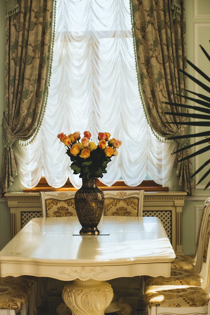 creative Luxurious dining room interior featuring ornate furniture and a floral centerpiece on the table.